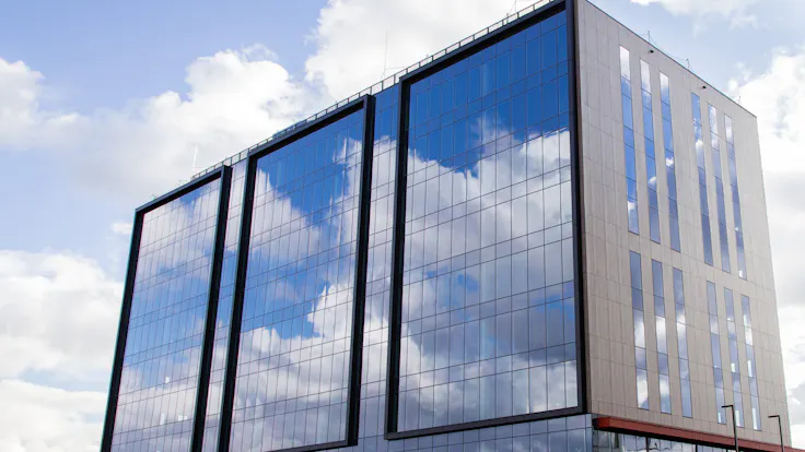 New build office building with Rockpanel Woods in Krakowie, Poland