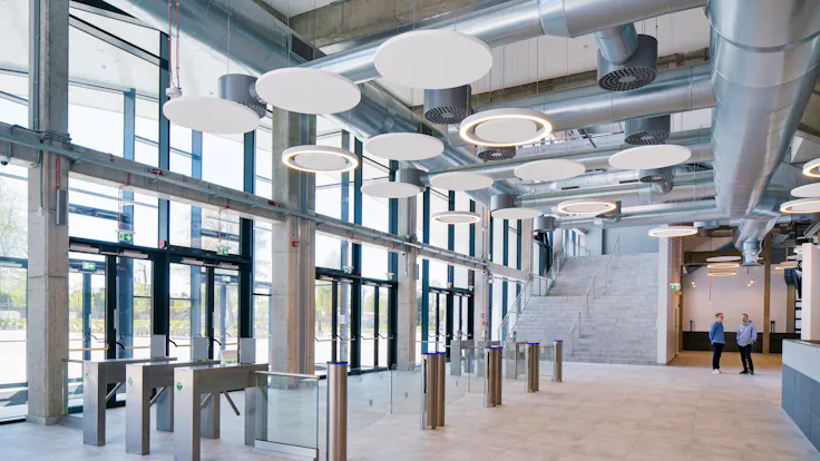 Lobby of Mosir sports centre in Puławy Poland with Rockfon Eclipse Island