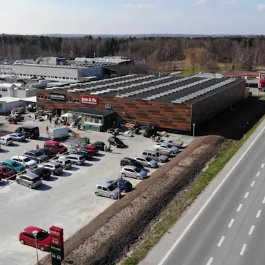 jem & fix store in Fredensborg, Denmark cladded with Rockpanel Woods facade cladding