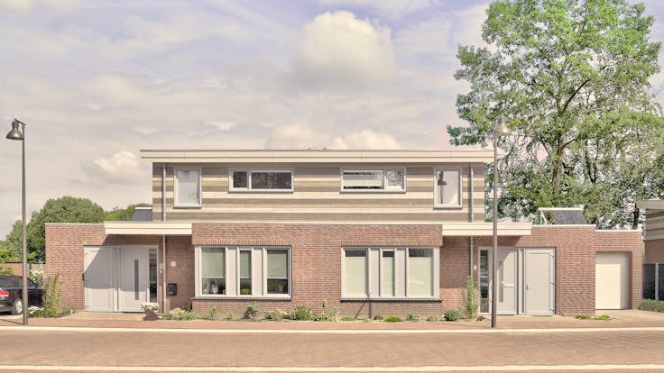 Houses in Wijbosch, Netherlands cladded with Rockpanel Woods facade cladding