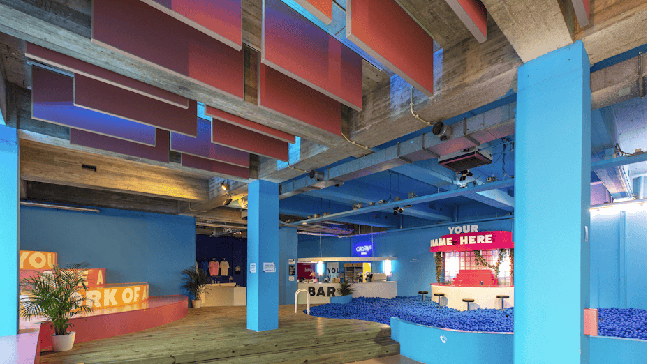 Youseum museum using acoustic baffles to enhance their ceiling while improve acoustics