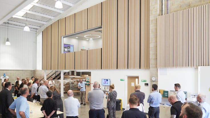 Rockfon Training Centre Launch Event 2 Staff and guests at the Rockfon Training Centre launch event in Daventry watching a presentation from FIS. Photographer: Hannah J Taylor