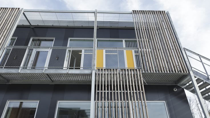 Klostermarksskolen in Roskilde, Denmark cladded with Rockpanel Colours RAL 7016 and RAL 7021 facade cladding