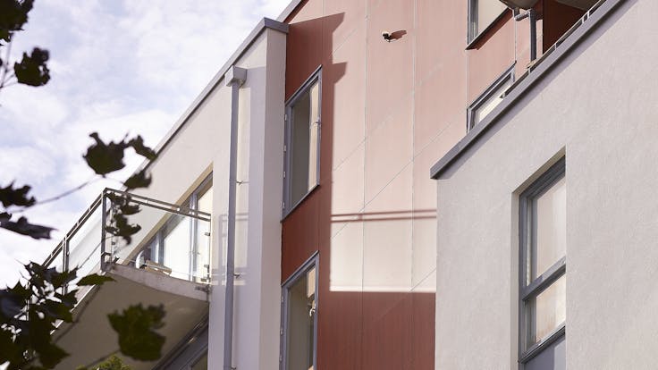 Eyot House (Multi Family House) in Bermondsey, London, United Kingdom cladded with A2 (FS-Xtra) in seven RAL colours plus Metallics Graphite Grey and Woods Cherry facade cladding.