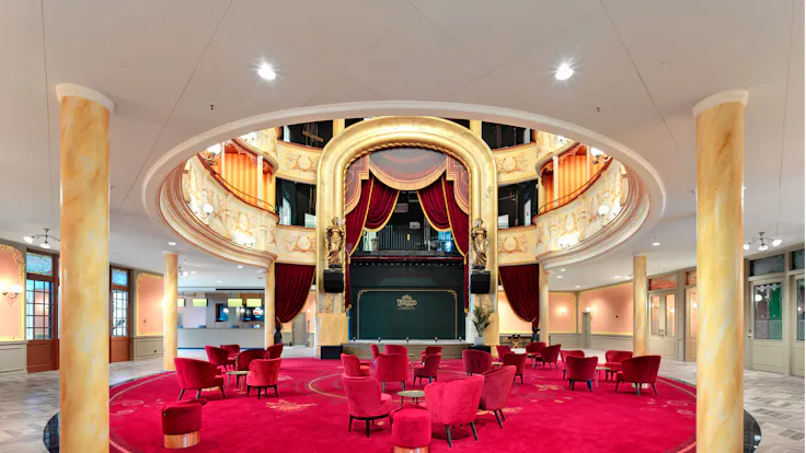 Auditorium and Lobby of Plopsa hotel in De Panne Belgium with Rockfon Color-all Stucco in D-edge