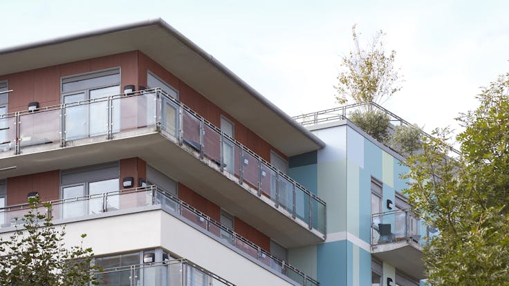 Eyot House (Multi Family House) in Bermondsey, London, United Kingdom cladded with A2 (FS-Xtra) in seven RAL colours plus Metallics Graphite Grey and Woods Cherry facade cladding.