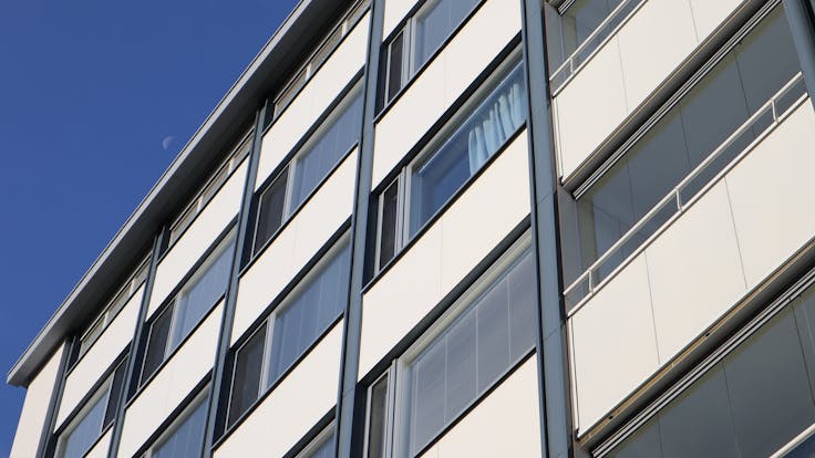 As Oy Kotikannas Case Study Finland Rockpanel Colours RAL9010, RAL7024 and RAL7031