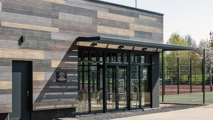 Sale de Sports in Celles, Belgium cladded with Rockpanel Woods facade cladding