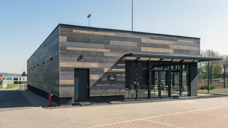 Sale de Sports in Celles, Belgium cladded with Rockpanel Woods facade cladding