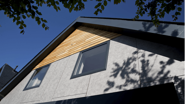 Single family houses in Tankerton, Whitstable, United Kingdom cladded with Rockpanel Stones facade cladding.