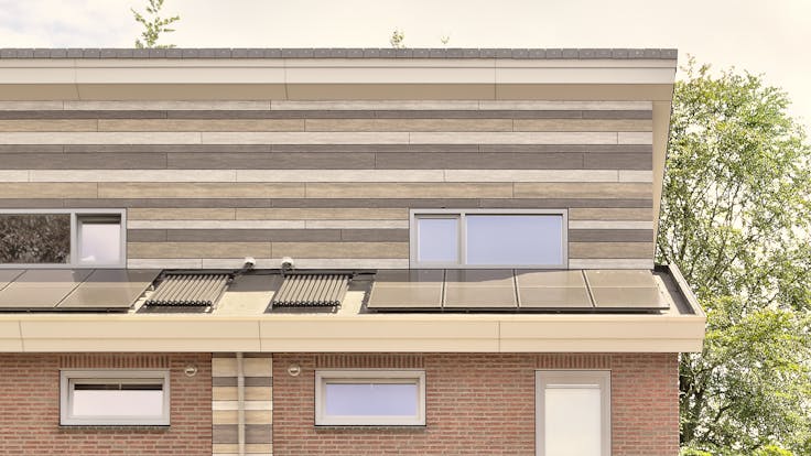 Houses in Wijbosch, Netherlands cladded with Rockpanel Woods facade cladding