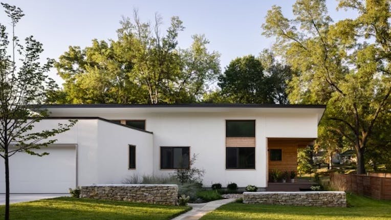 A Pretty Good House, Waldo Project Stucco cladding