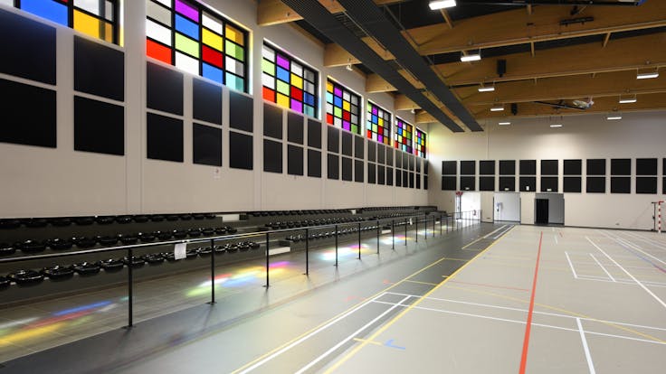 Gymnasium in Gymnase communal de Batilly in Batilly France with Rockfon VertiQ Metal