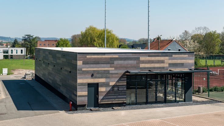Sale de Sports in Celles, Belgium cladded with Rockpanel Woods facade cladding
