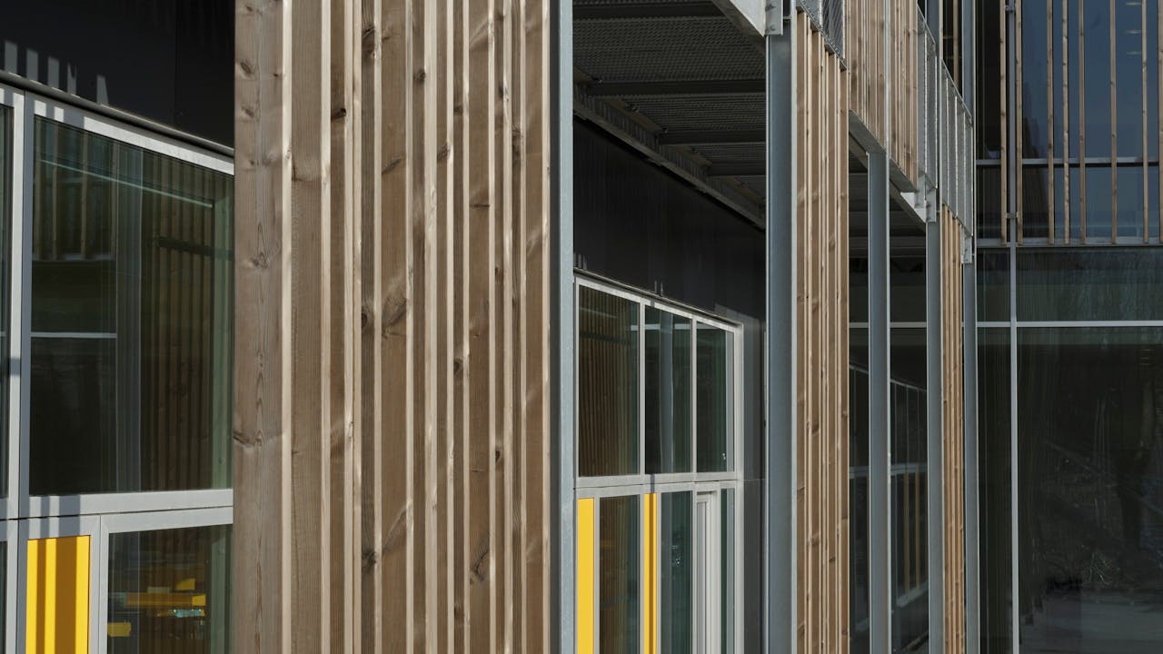 Klostermarksskolen in Roskilde, Denmark cladded with Rockpanel Colours RAL 7016 and RAL 7021 facade cladding