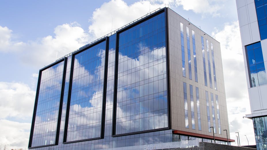 A modern office building in Krakow, Poland with Rockpanel Woods exterior cladding