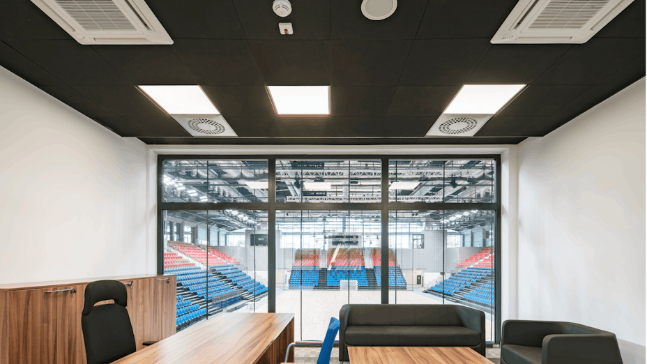 Meeting room in Mosir sports centre in Puławy Poland with Rockfon Color-all