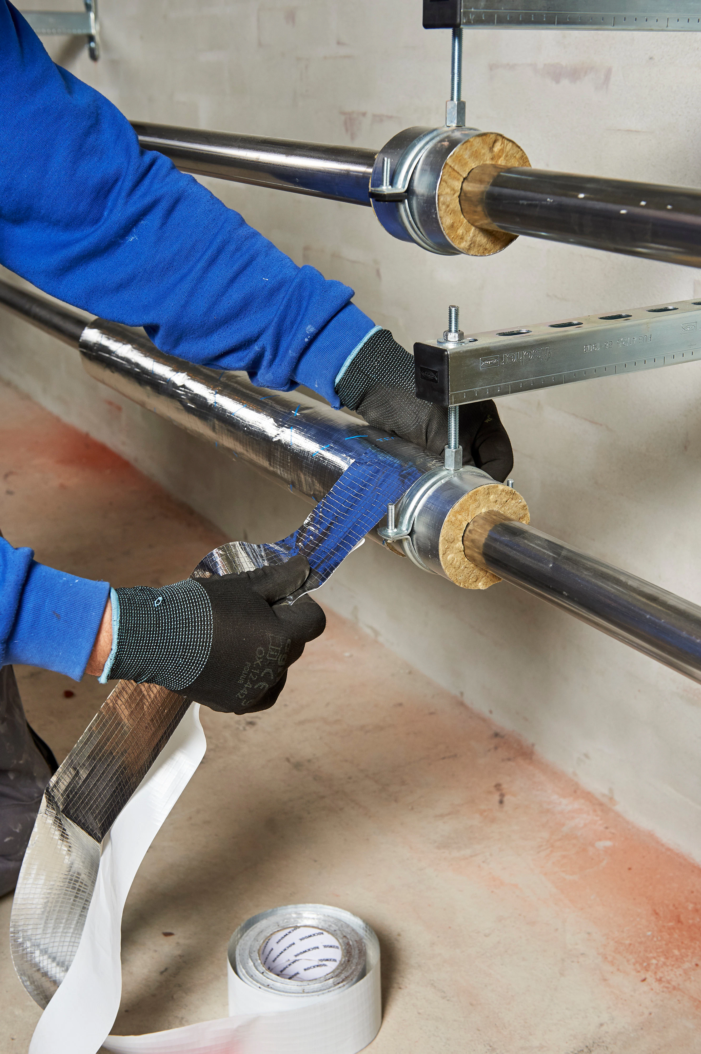 Reference case, TECLIT, Kolding Sygehus, Hospital, technical insulation, ITI, lamella mat, pipe section, case study, HVAC, cooling, Alu tape, flex tape, hanger