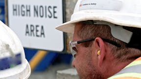 Construction Worker Hearing Protection - architectural acoustics external blocking noise from the exterior of the building - loud construction work outside the office