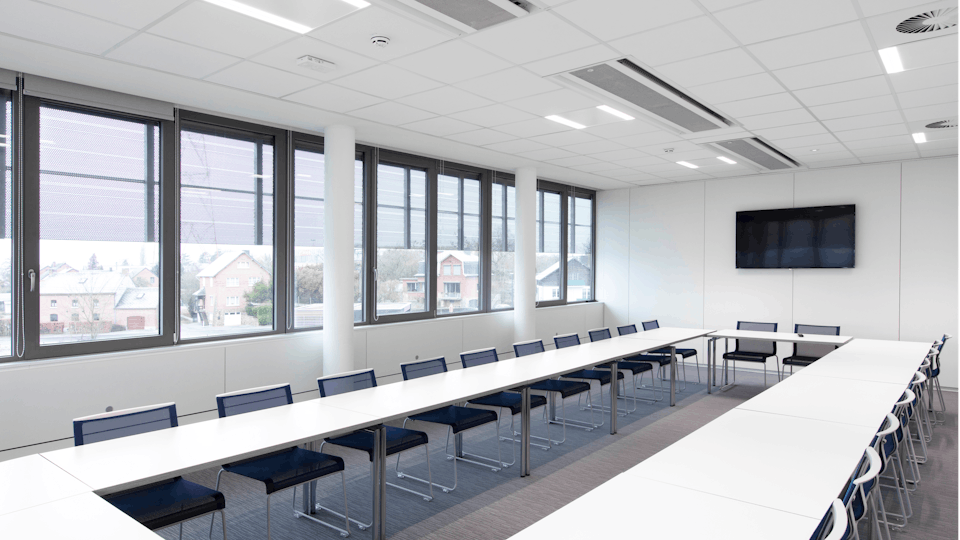 Office meeting room contains sound absorption in the suspended ceiling