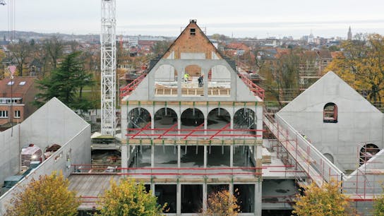 parksite leuven, the parksite, the parksite in leuven, building under construction, energetic expansion and total renovation, chapel renovation, reference project, referentie, rockroof flexi plus, prefabricated panels, high ceilings and arches, leuven, belgium