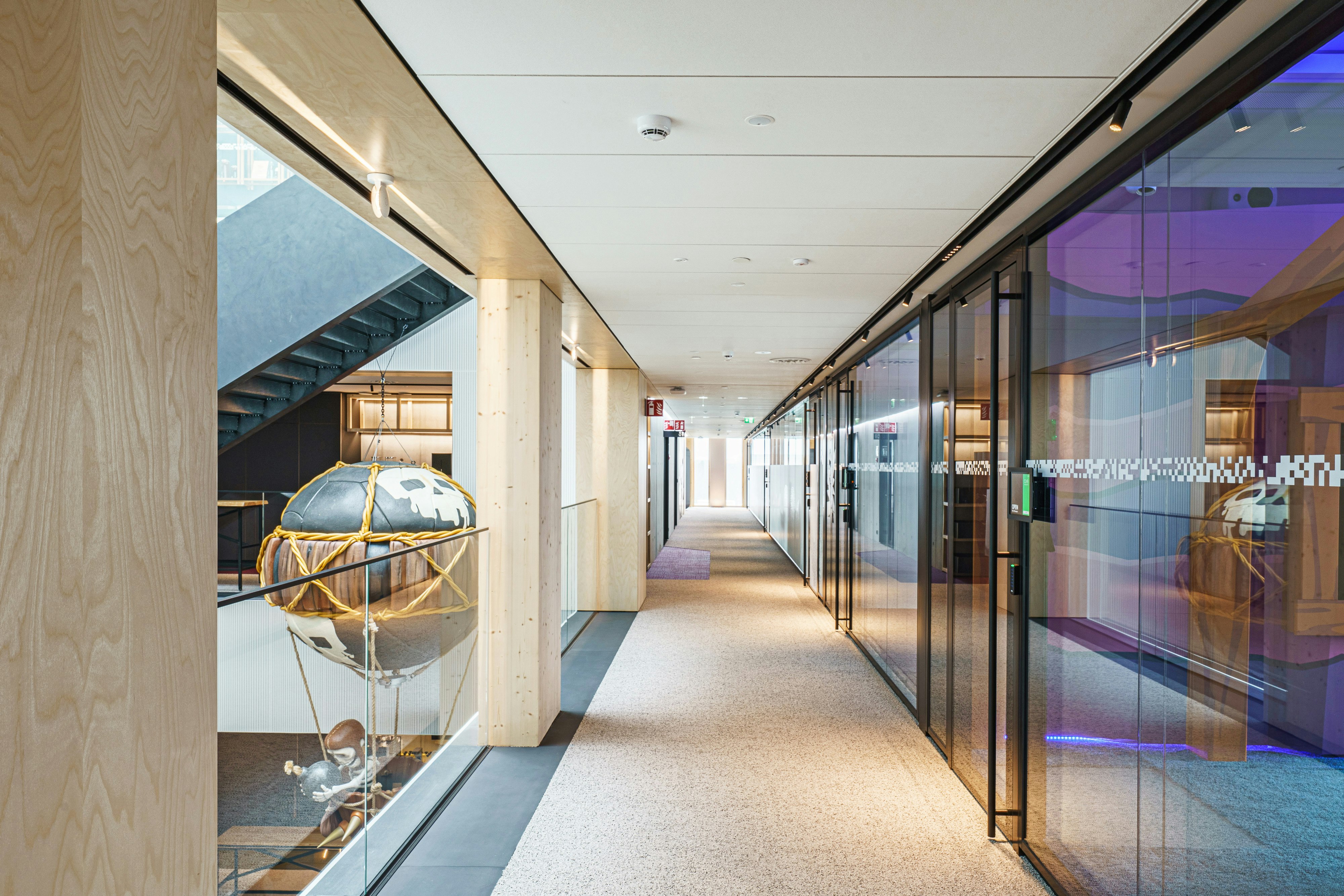 Corridor in office Wood City in Helsinki Finland with Rockfon Sonar in M-edge