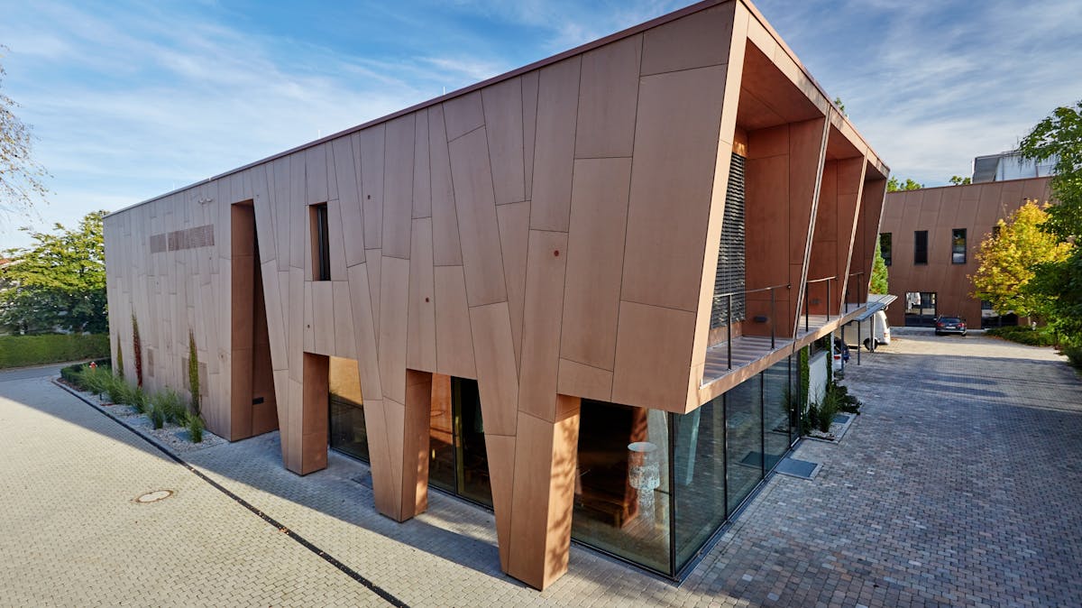 Office/production building with Rockpanel Natural facade cladding in Eggenfelden, Germany.