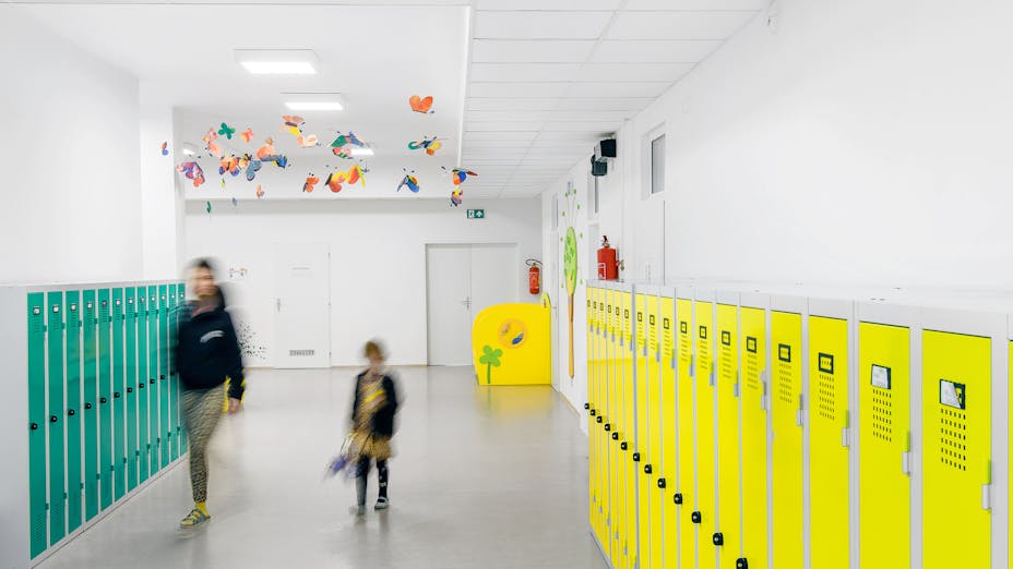 Corridor in Gen. František Fajtl's elementary school in Prague Czech Republic with Rockfon Artic A24-Edge