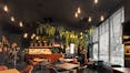 Restaurant of Plopsa hotel in De Panne Belgium with Rockfon Color-all Charcoal in D-edge