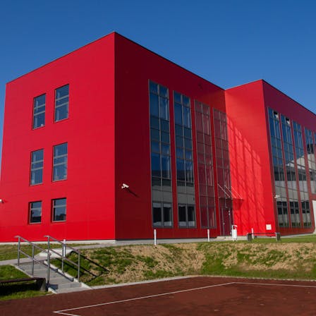 School in Rzeszów, Poland cladded with Rockpanel Colours RAL 3001 and RAL 5010 facade cladding