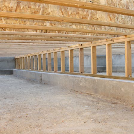 Construction Site: Neat Clean Crawlspace, Floor Joists, and Pony Wall - crawl space design and installation process