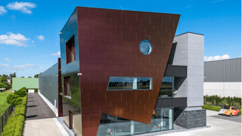 Sherwin office in Kortenberg, Belgium cladded with Rockpanel Chameleon facade cladding.