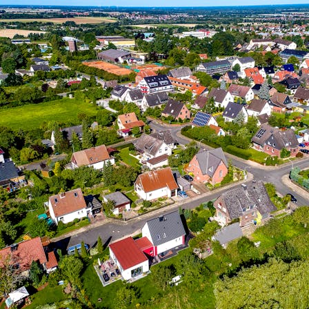 Suburban neighborhood,  single family houses, solar, village, town, German suburb near Wolfsburg, Germany