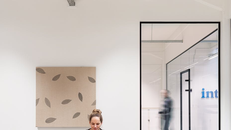 Open Plan Office in intoAction in Best Netherlands with Rockfon Eclipse Senses A-Edge