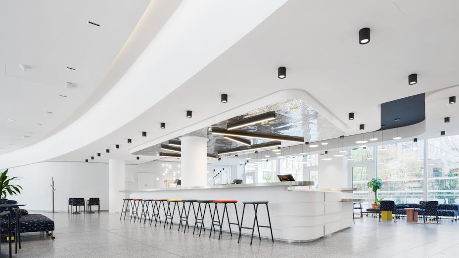 Canteen in New flexible office So Pop in Saint-Ouern-sur-Seine France with Rockfon Mono Acoustic TE-Edge