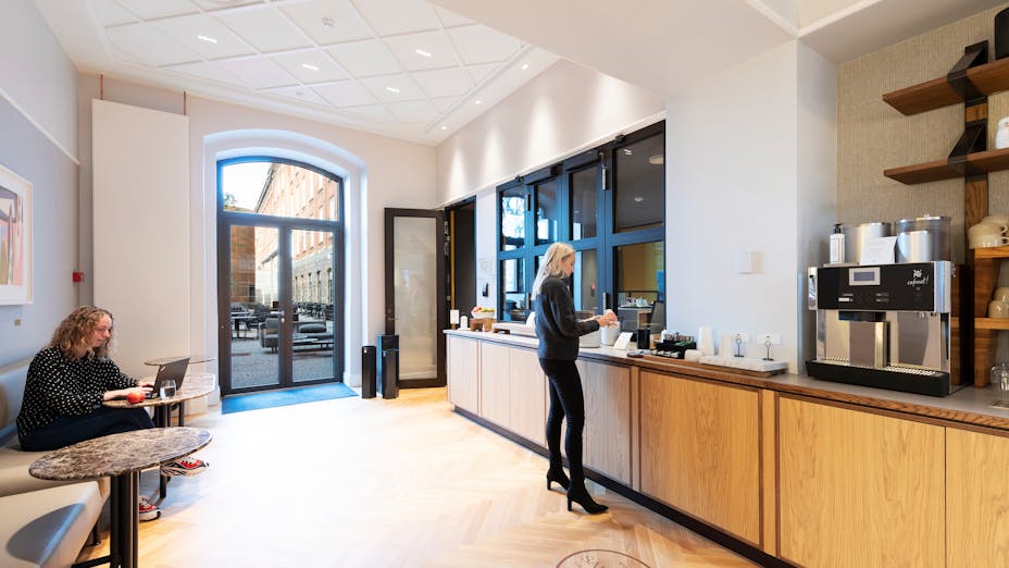 Coffee Corner in Hotel Villa Copenhagen Denmark with Rockfon Blanka tiles.