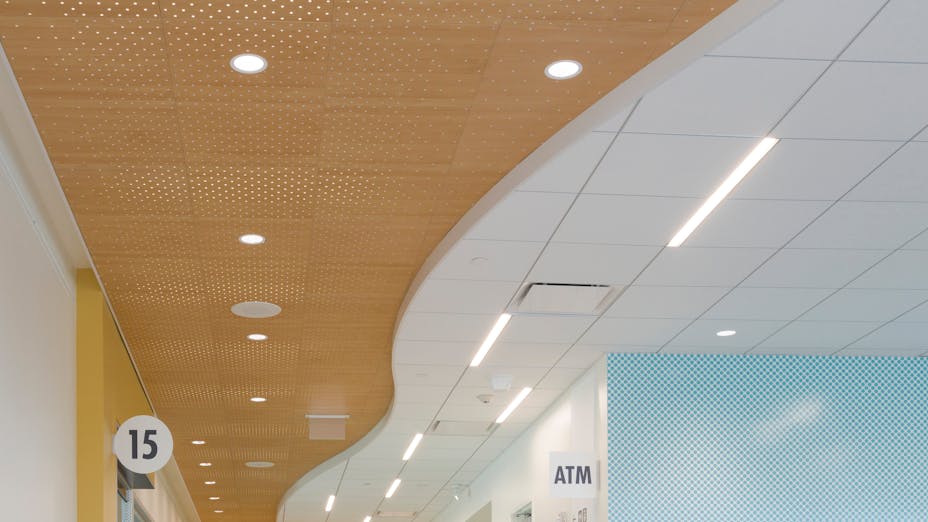 NA, Kaiser Permanente Mission Bay Medical Offices, KMD Architects, Rockfon Artic®, Rockfon® Spanair® Torsion Spring concealed metal ceiling panels; Chicago Metallic® Ultraline™ and 1200 Series 15/16-inch ceiling suspension system; Rockfon® Infinity™ Perimeter Trim
