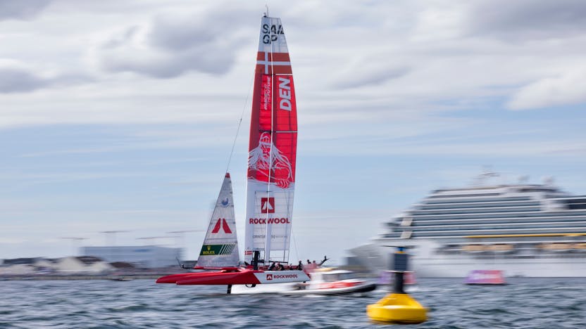 Denmark SailGP Team presented by ROCKWOOL helmed by Nicolai Sehested in action on Race Day 2 of the ROCKWOOL Denmark Sail Grand Prix in Copenhagen, Denmark. 20th August 2022. Photo: Felix Diemer for SailGP. Handout image supplied by SailGP