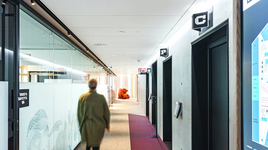 Corridor in office Wood City in Helsinki Finland with Rockfon Sonar in M-edge