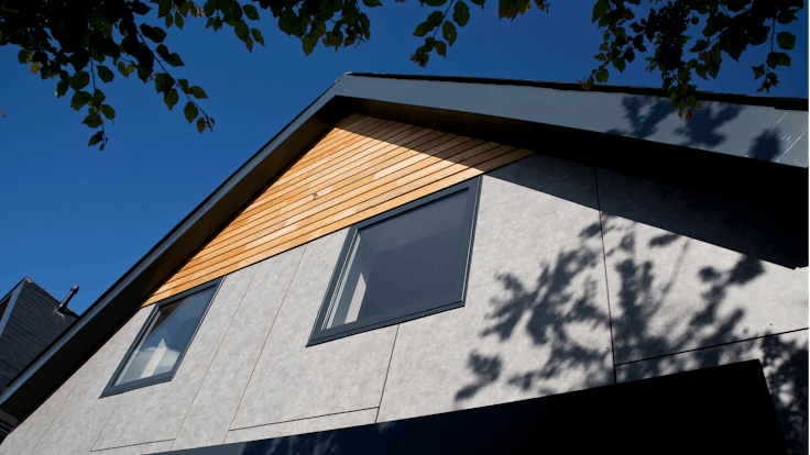 Single family houses in Tankerton, Whitstable, United Kingdom cladded with Rockpanel Stones facade cladding.