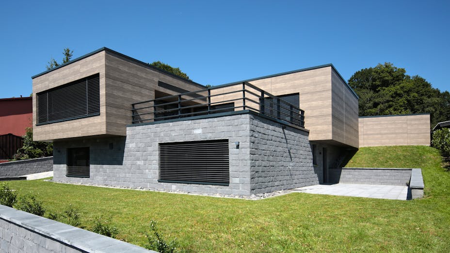 Single family house in Steinen-Lehnacker, Germany cladded with Rockpanel Woods Rhinestone Oak facade cladding