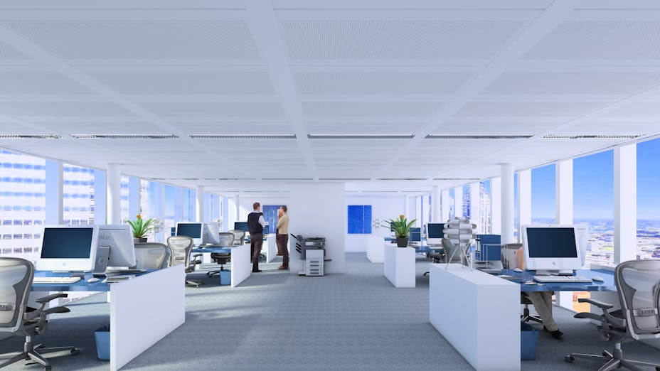 Rockfon metal ceiling solutions installed in open plan office environment to noise noise and improve productivity.