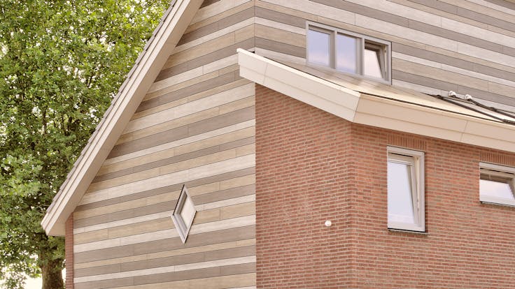 Houses in Wijbosch, Netherlands cladded with Rockpanel Woods facade cladding