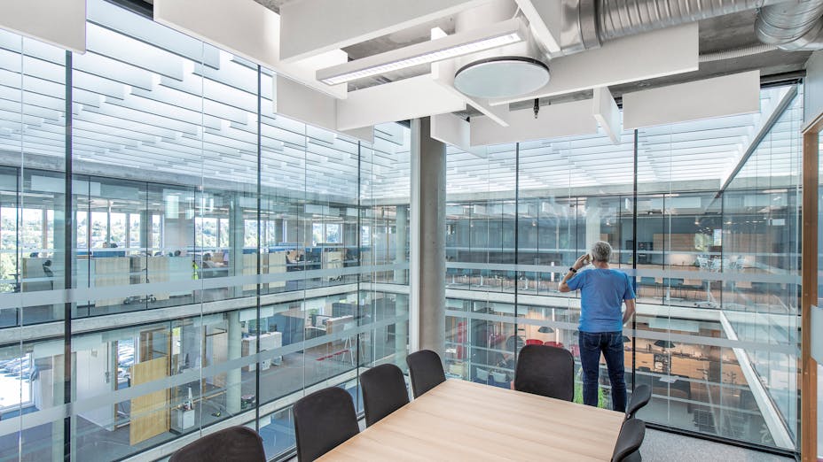 Acoustic free-hanging baffles installed in office