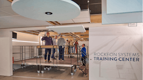 BE, Wijnegem Rockfon training center, installation room, photo wall and training center name