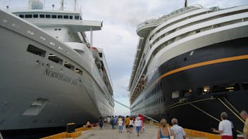 Two cruise ships in dock.