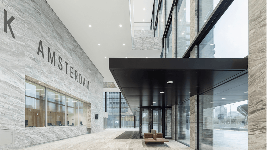 Reception area of Nieuwe Rechtbank in Amsterdam The Netherlands with Rockfon Mono Acoustic