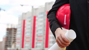 Contractor with ROCKWOOL red hardhat
