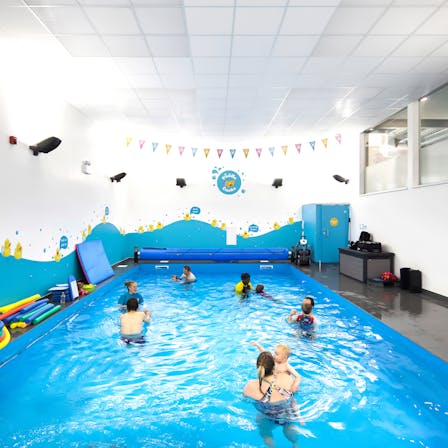 Swimming Pool in Puddle Ducks Swim School in Northwich United Kingdom Rockfon CleanSpace Pro with A-Edge