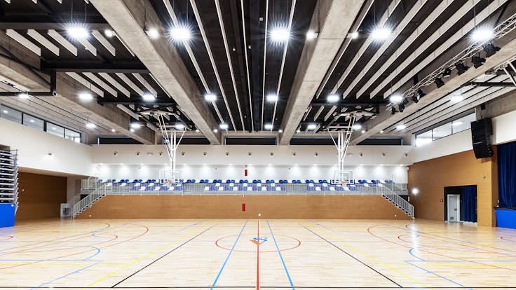Sport hall in American School of Barcelona in Barcelona Spain with Rockbaffle Deco A-Edge 600x1200